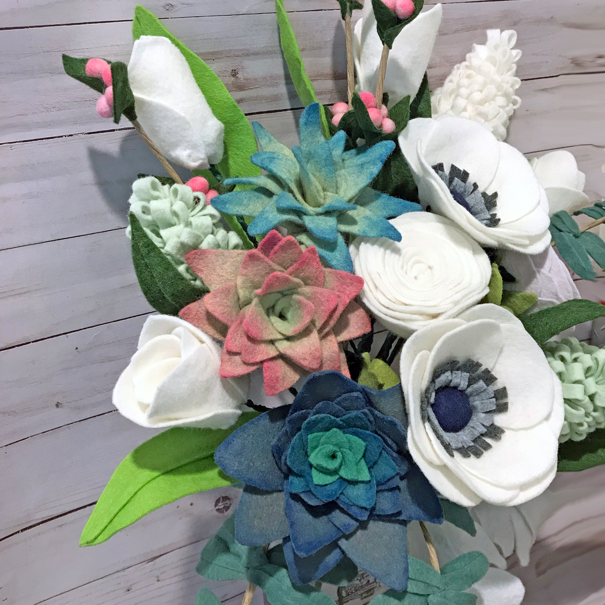 Anenome, Fern, Hyacinth, and Succulent Arrangement